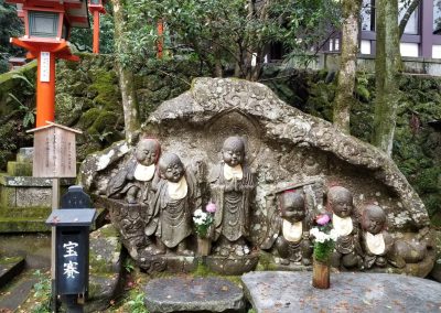 Statues of children on the Mount Kurama path