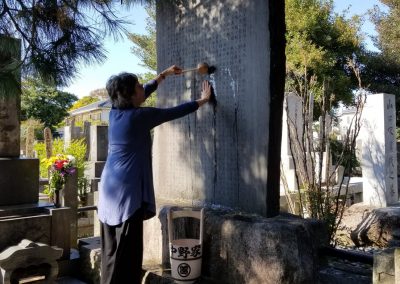 Kandi Austin at the memorial stone of Mikao Usui