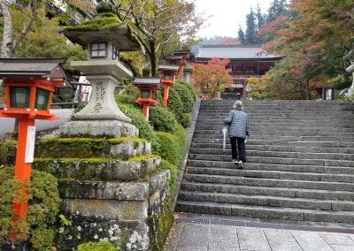 Kandi Austin at the entrance to Mount Kurama