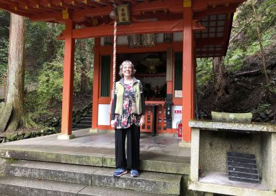 Kandi Austin at a small shrine on the path to Kurama-dear temple